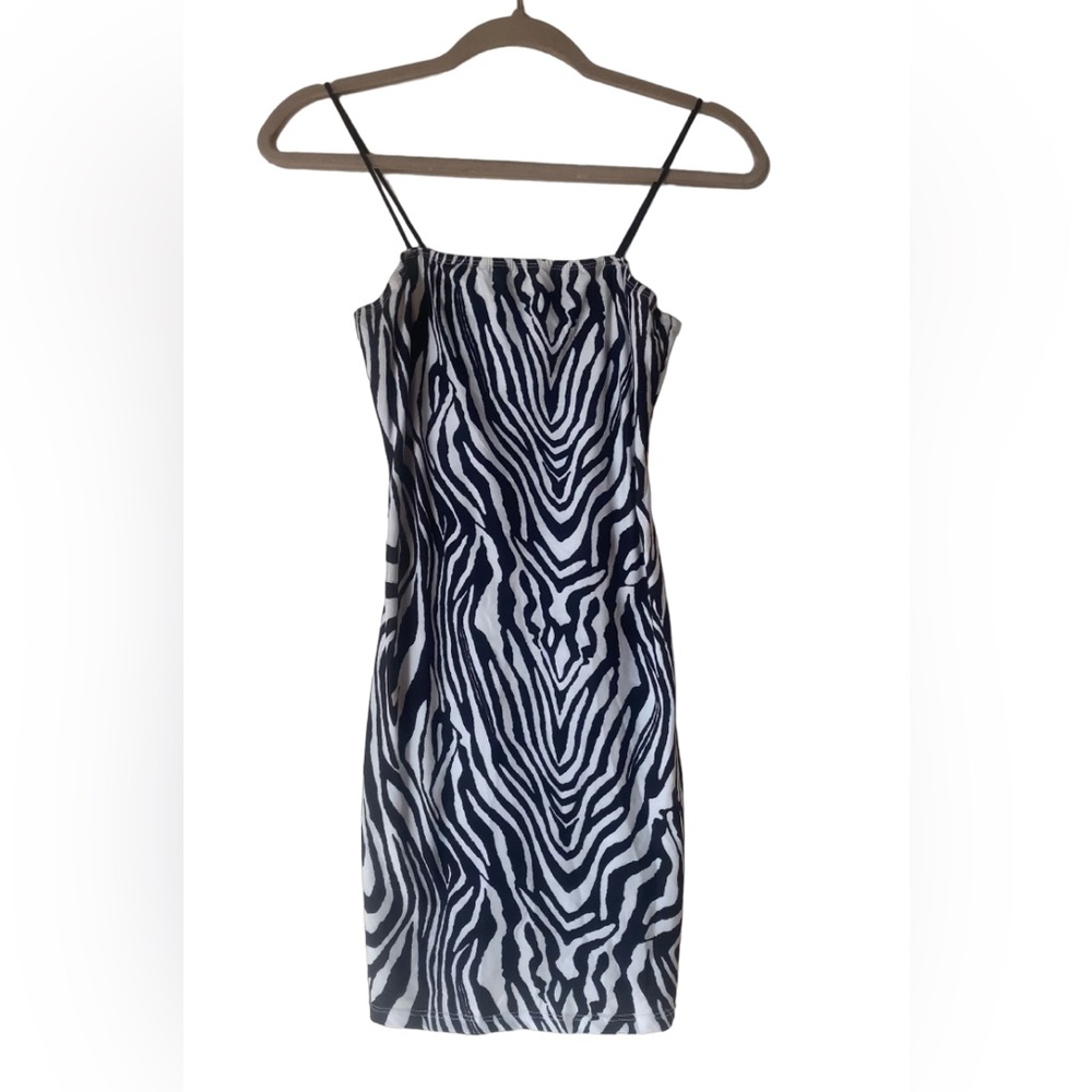 Zebra stripped slip body con dress. Never worn